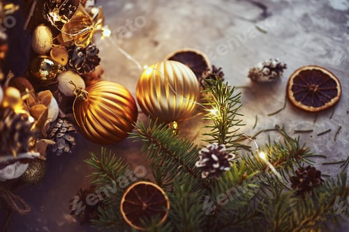 Preview: Christmas decorations with garland lights and fir tree branch