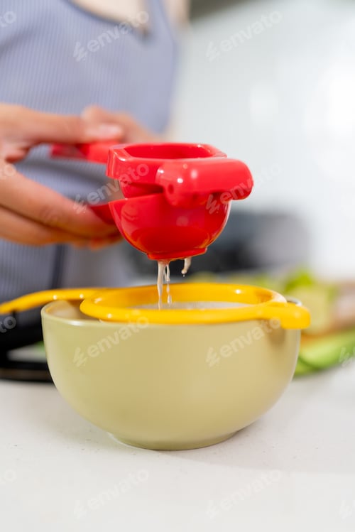 Preview: Chef squeezing lime juice for preparing peruvian ceviche recipe