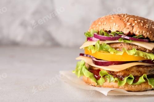 Preview: Delicious hamburger on table. Space for text