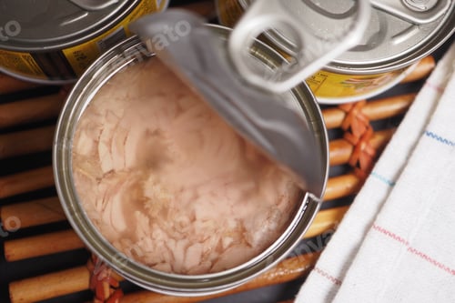 Preview: canned tuna on wooden table ,