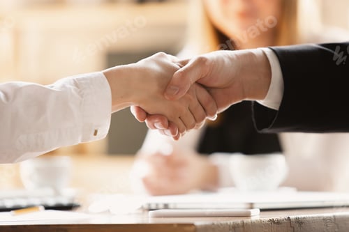 Preview: Close up of caucasian human hands, shaking, working in office, business, people