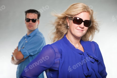 Preview: Fashion Young Couple With Sunglasses. Studio Shot.