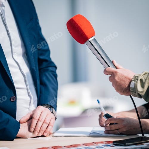 Preview: Journalist Interview. Speaker Answering Questions.