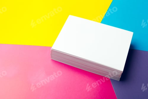 Preview: Business card blank over colorful abstract background.