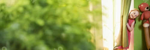Preview: Child Playing Peekaboo by Curtain Wide Banner with Copy Space