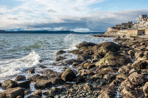 Preview: A Veiw Of The Rocky Shoreline In West Seattle, Washington.