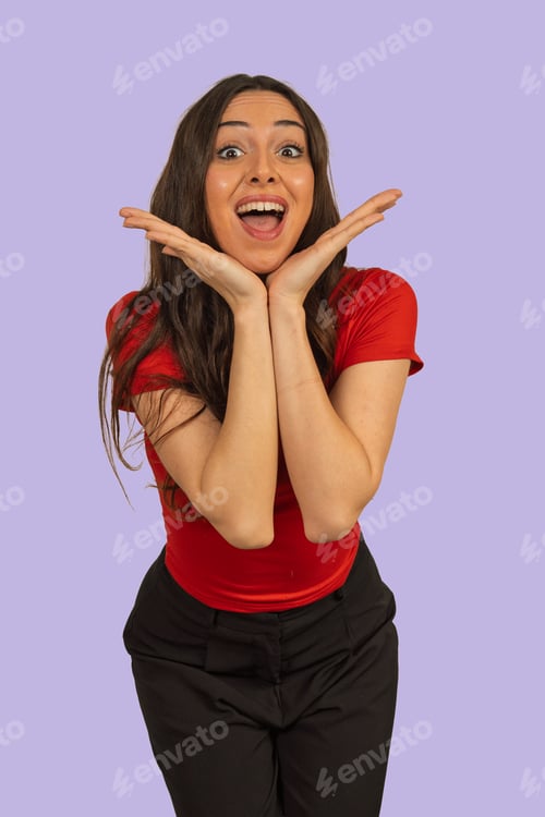 Preview: Woman expressing surprise joy with hands on face