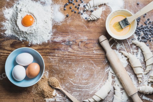 Preview: Baking ingredients for cooking croissants over wooden background, copy space