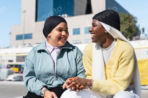 Preview: Young muslim girl friends having fun in the city - Trendy influencers in Middle East