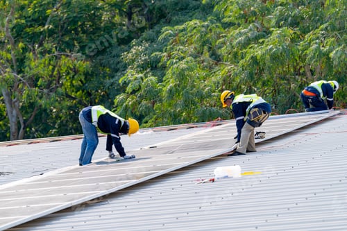 Preview: workers installing solar panels, for efficient energy on rooftop