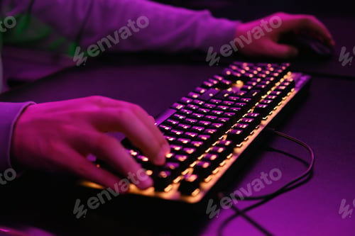 Preview: Close-up of a keyboard in neon color