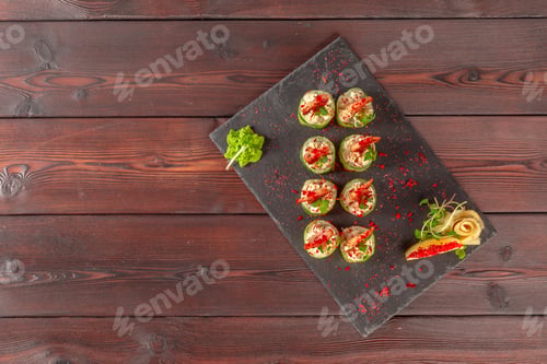 Preview: fresh sushi on rustic wooden table