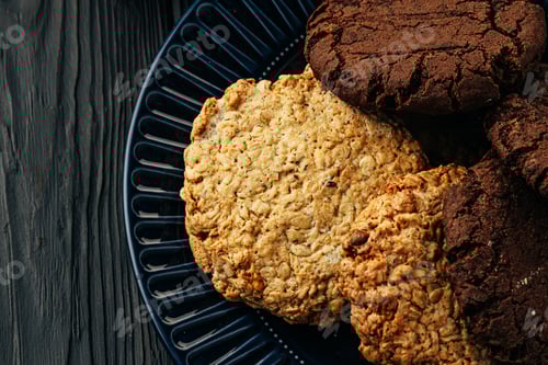 Preview: Delicious Cookies on a Navy Blue Plate