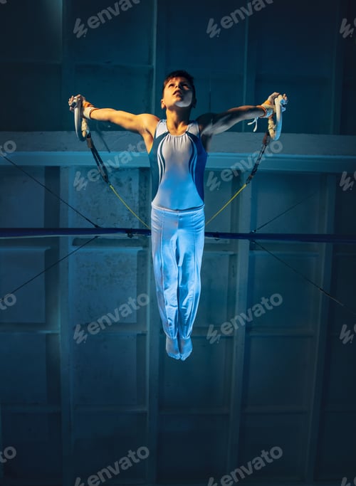 Preview: Little male gymnast training in gym, flexible and active