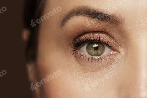 Preview: Aged female eye with wrinkled skin