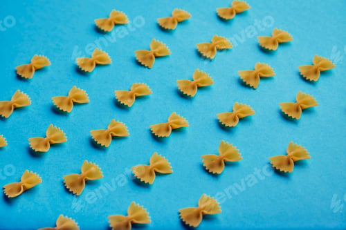 Preview: Farfale pasta pattern on turquoise background side view