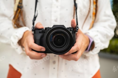 Vista previa: Fotógrafo creativo con cámara