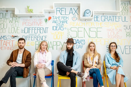 Preview: Group of diverse people on the white wall background