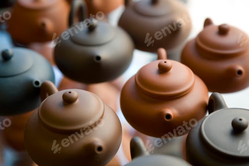 Preview: High angle close up of traditional brown clay teapots.
