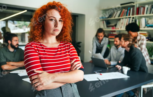 Preview: Happy young business woman in startup office. Business success woman.