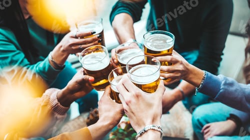 Preview: Group of people drinking beer at brewery pub restaurant