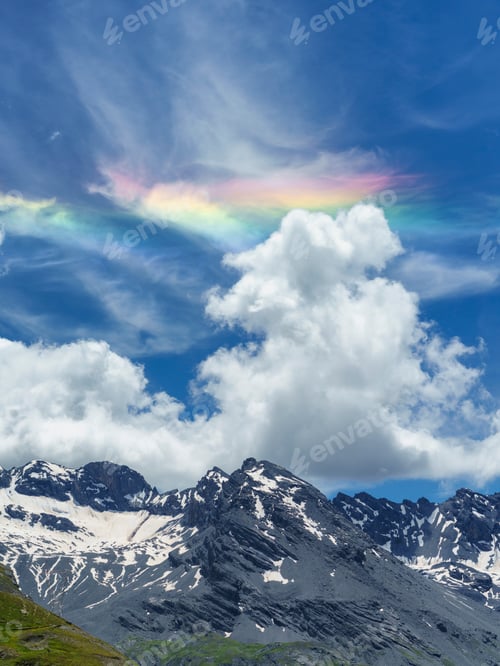 Preview: Iridescent cloud over the road to Stelvio pass (Lombardy) at summer
