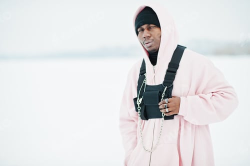 Preview: Stylish urban style african american man in pink hoodie
