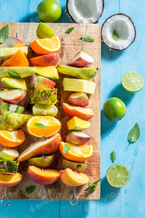 Preview: Colorful skewers with pieces of mixed fresh fruit