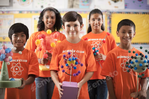 Preview: A group of children in Science Club, holding molecular models