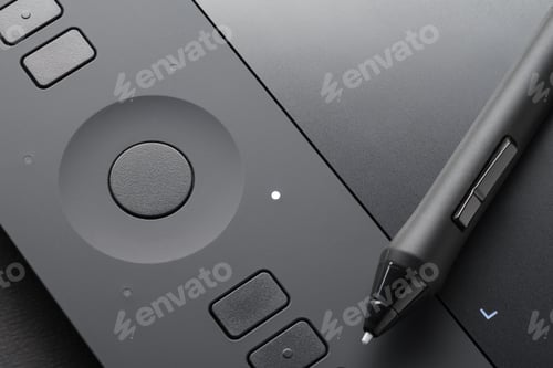 Preview: Graphic tablet with pen, close-up photo.