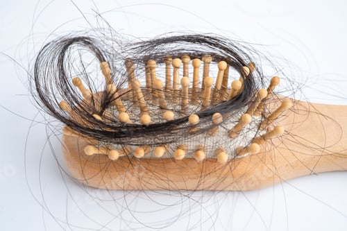 Preview: Hair loss fall with comb bush serious problem health, beauty and cosmetic concept.