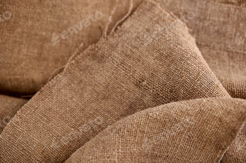 Preview: A Piece Of Old Burlap, Isolated On A White Background. Natural Sackcloth Textured For Background