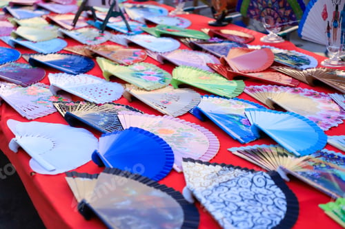 Preview: Table with colorful hand fans