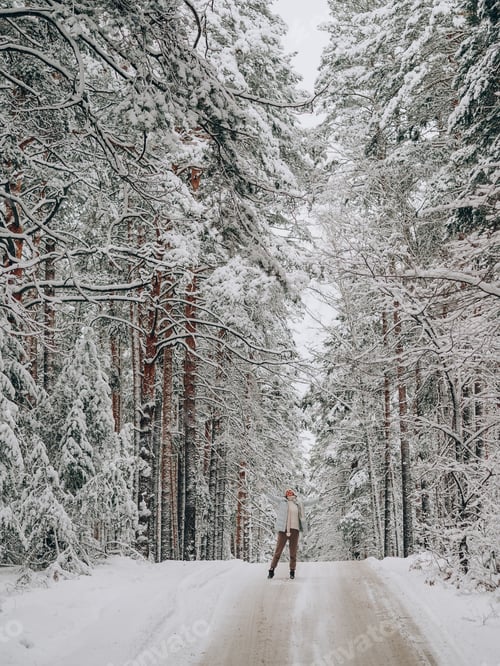 Preview: girl in big beautiful world in winter forest