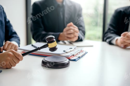 Preview: Lawyer working about legal legislation in courtroom to help their customer.