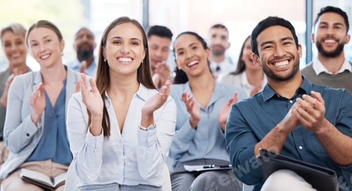 Preview: Diverse group of smiling businesspeople clapping in office training. Team of professional colleague