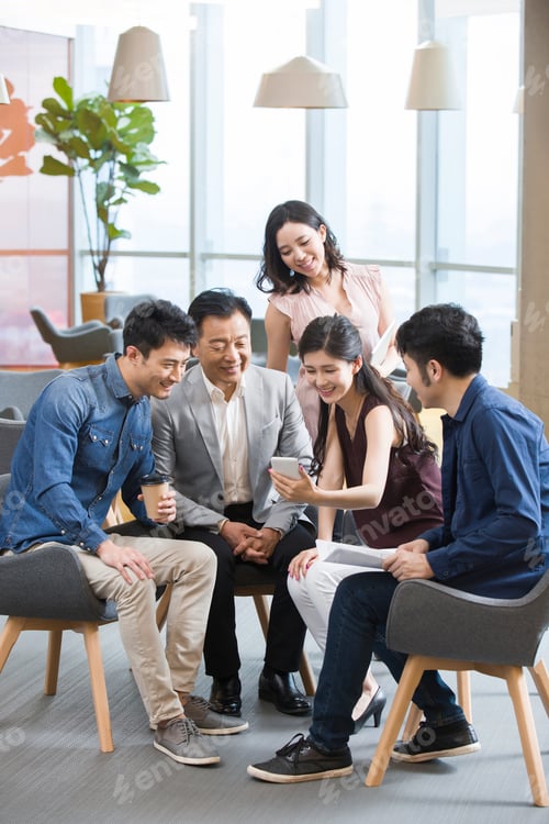 Preview: Business people talking in meeting