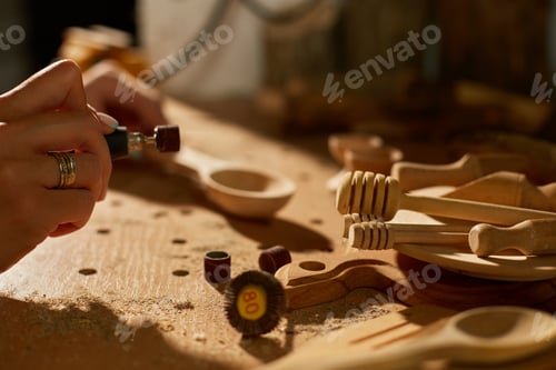 Preview: Female using power working tools graver for wooden utensils spoon