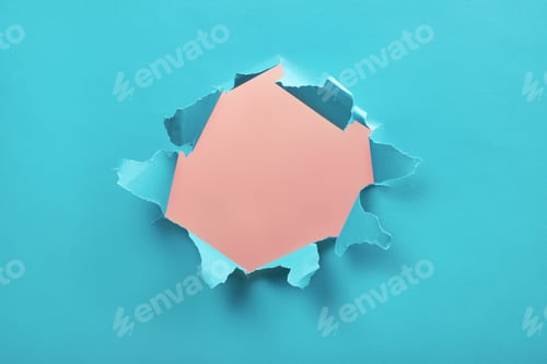 Preview: Torn hole in blue paper, ripped edges