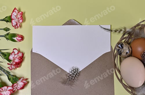 Preview: Composition with Easter eggs and branches on yellow background.Postcard.