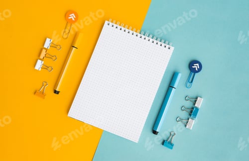 Preview: School supplies. Yellow and blue colors. Empty notebook. Flat lay composition. Space for text.