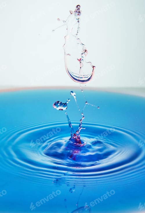 Preview: Abstract background of splash of color water, collision of colored drops, the concept