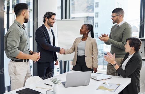 Preview: Shot of a group of businesspeople having a meeting in an office at work