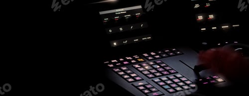 Preview: Edit video production control panel in studio. Editor editing and grade film in movie post room.