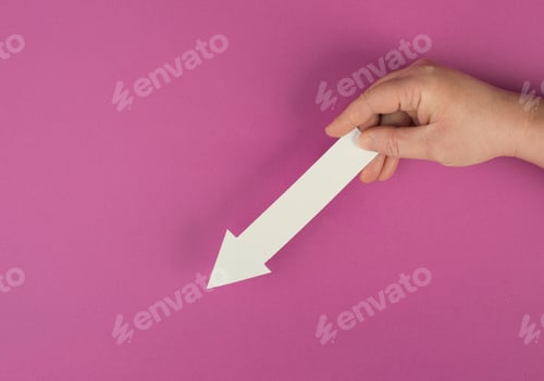 Preview: Holding an arrow in the hand, showing down, negative evaluation, financial recession