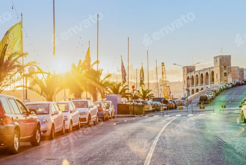 Preview: Scenic view of the evening street of Kalkara Malta in the rays of sunset Toned instagram effect