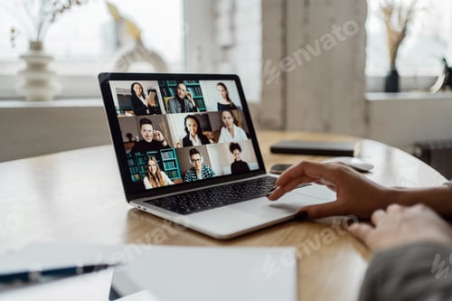 Preview: Video communication woman with colleagues freelancer workplace uses laptop computer company report