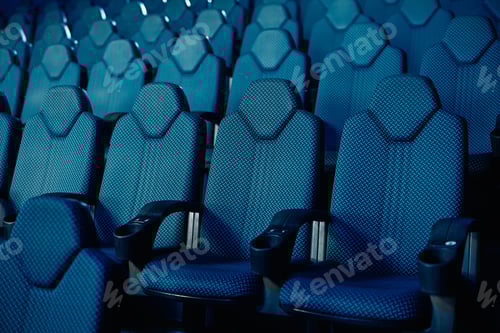 Preview: Empty blue seats at the cinema.
