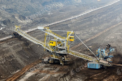 Preview: aerial view in coal mine with bucket wheel excavator. destruction of nature. fossil energy.