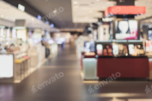 Preview: Abstract blurred image of cosmetics department in the mall